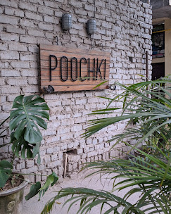 Poochki Table cafe interior Shahpur Jat