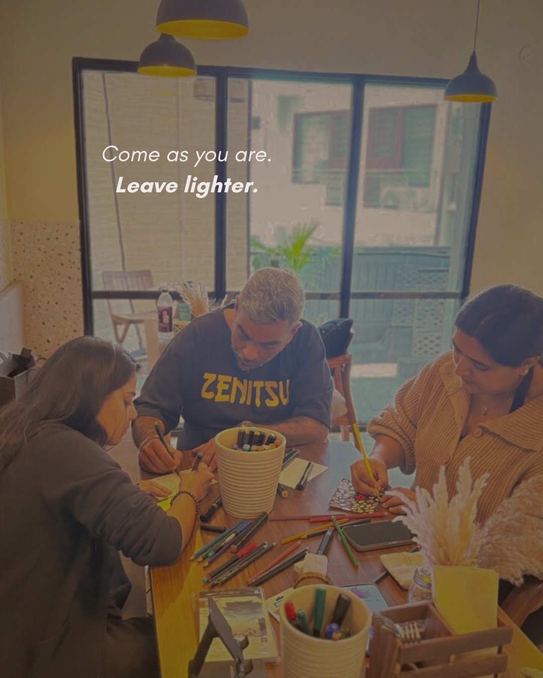 Art corner at Solchemi — guests painting and drawing Shahpur Jat