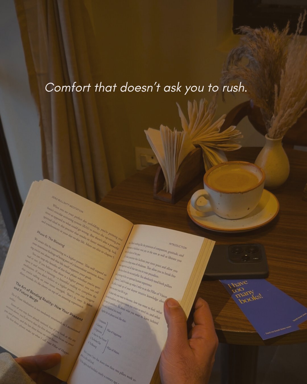 Quiet afternoon at Solchemi cafe Shahpur Jat — book, latte and pampas